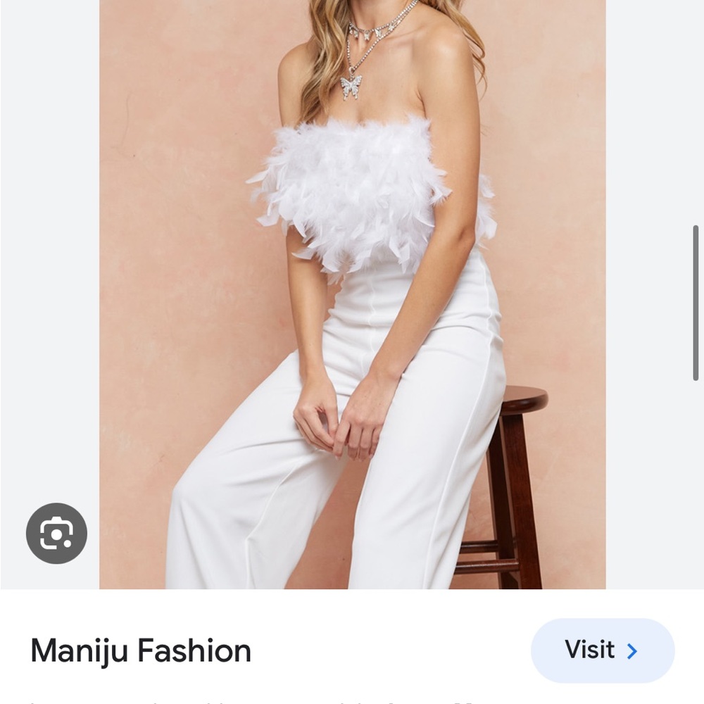 White feather jump suit